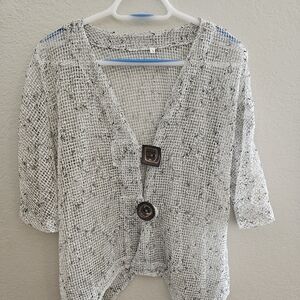 NWOT hand-made, sweater. Size- small (runs big).  Colors black and taupe.